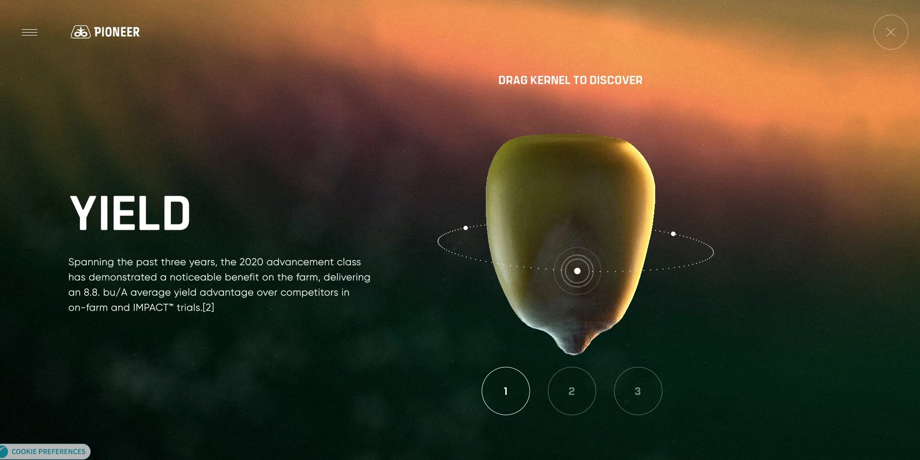The new-class layer, with an enlarged corn kernel in front of an orange-pink sunset, DRAG KERNEL TO DISCOVER above it, a dotted orbit and a dot circling the kernel, the large white word YIELD and a description on the left, and three round page numbers 1, 2 and 3 below