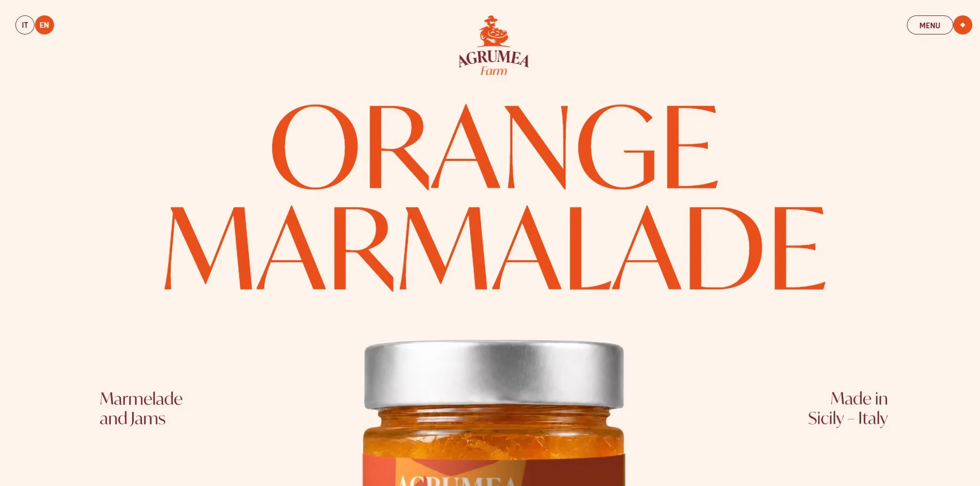 The first screen of a product page, the orange serif words ORANGE MARMALADE spanning the screen in two lines, a silver-lidded jar of orange marmalade rising from the bottom edge with only its upper half showing, and a small line of text on each side giving the category and the origin.
