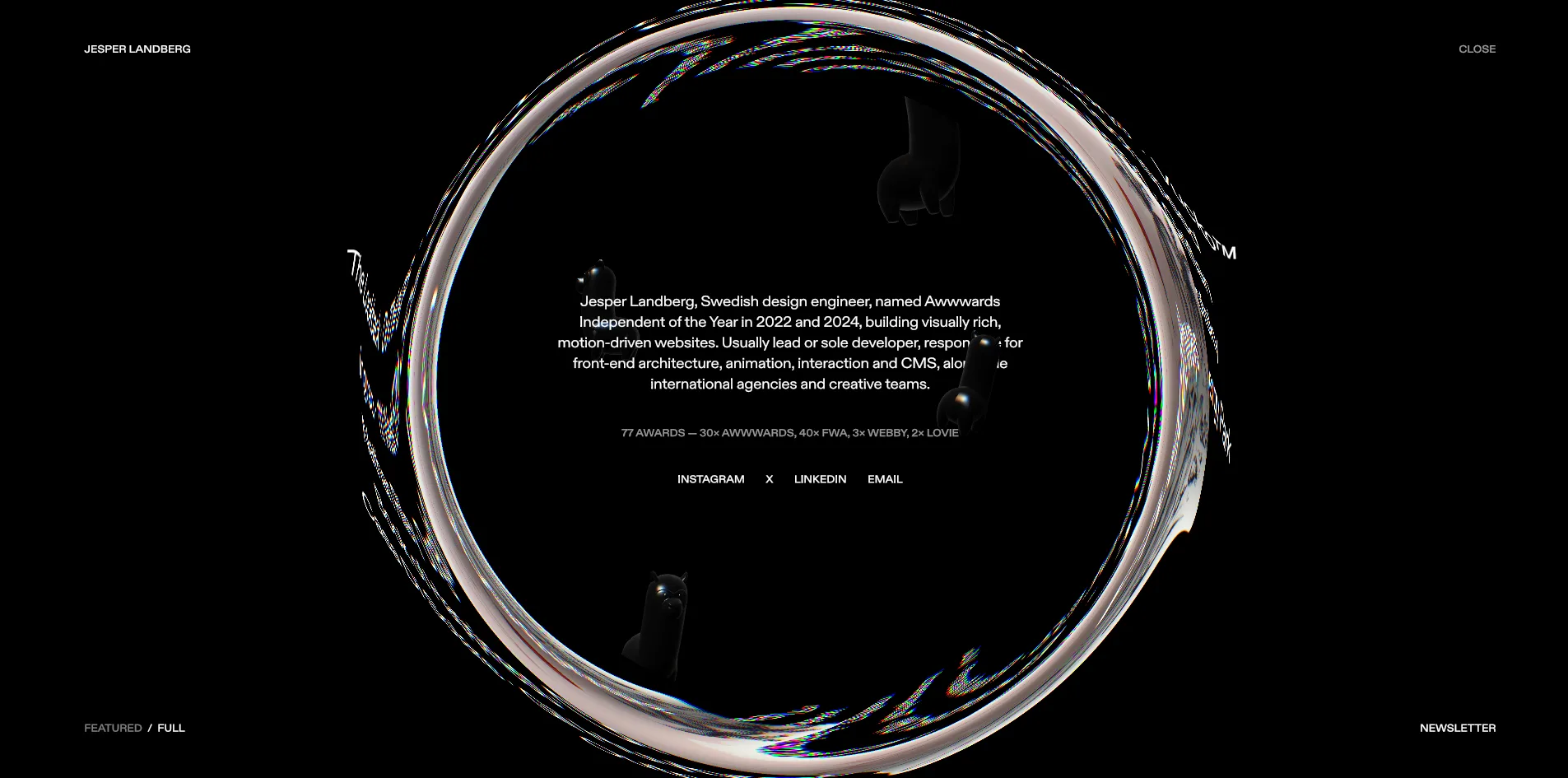 With PROFILE open, a very large ring sits in the middle of the black frame. The ring is made of stretched and curved silver-white imagery with fine red, green and blue fringes along its inner and outer edges, and inside it a few lines of small white text give Jesper Landberg's introduction, the line 77 AWARDS and the four links INSTAGRAM, X, LINKEDIN and EMAIL.