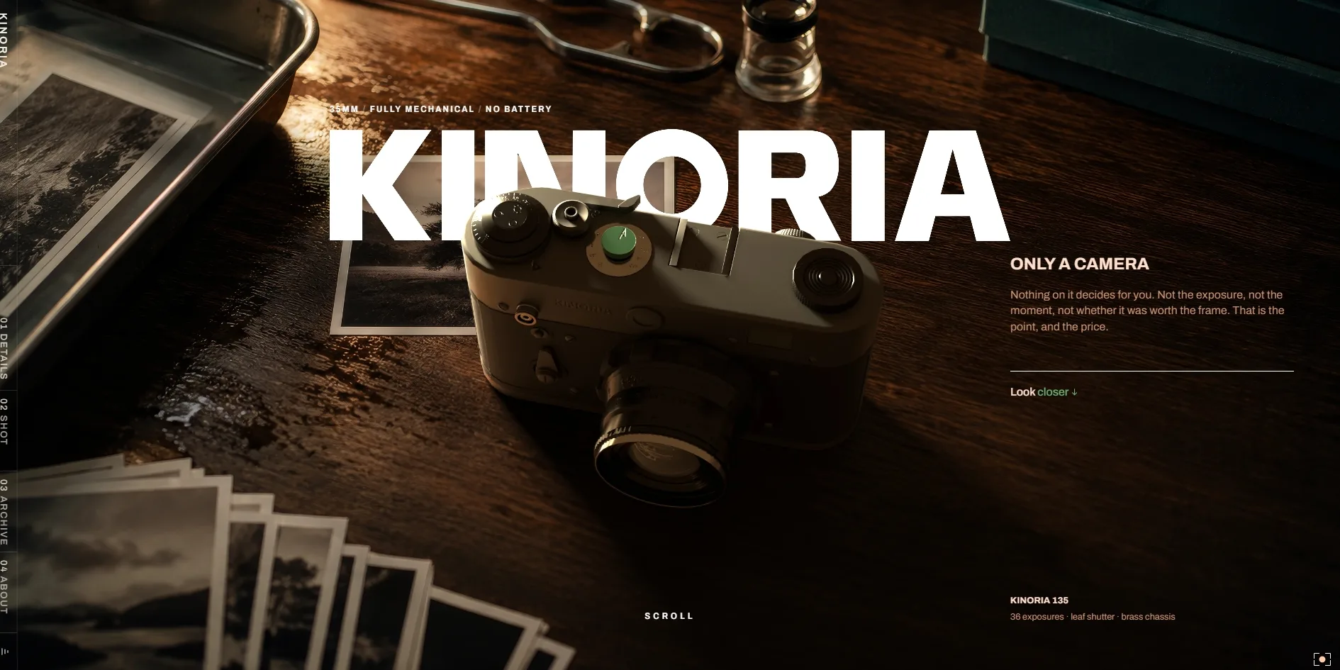 The first screen, with a silver camera on a wooden desk, the white letters KINORIA behind it, a developing tray and a stack of prints on the left, and ONLY A CAMERA with a short paragraph on the right