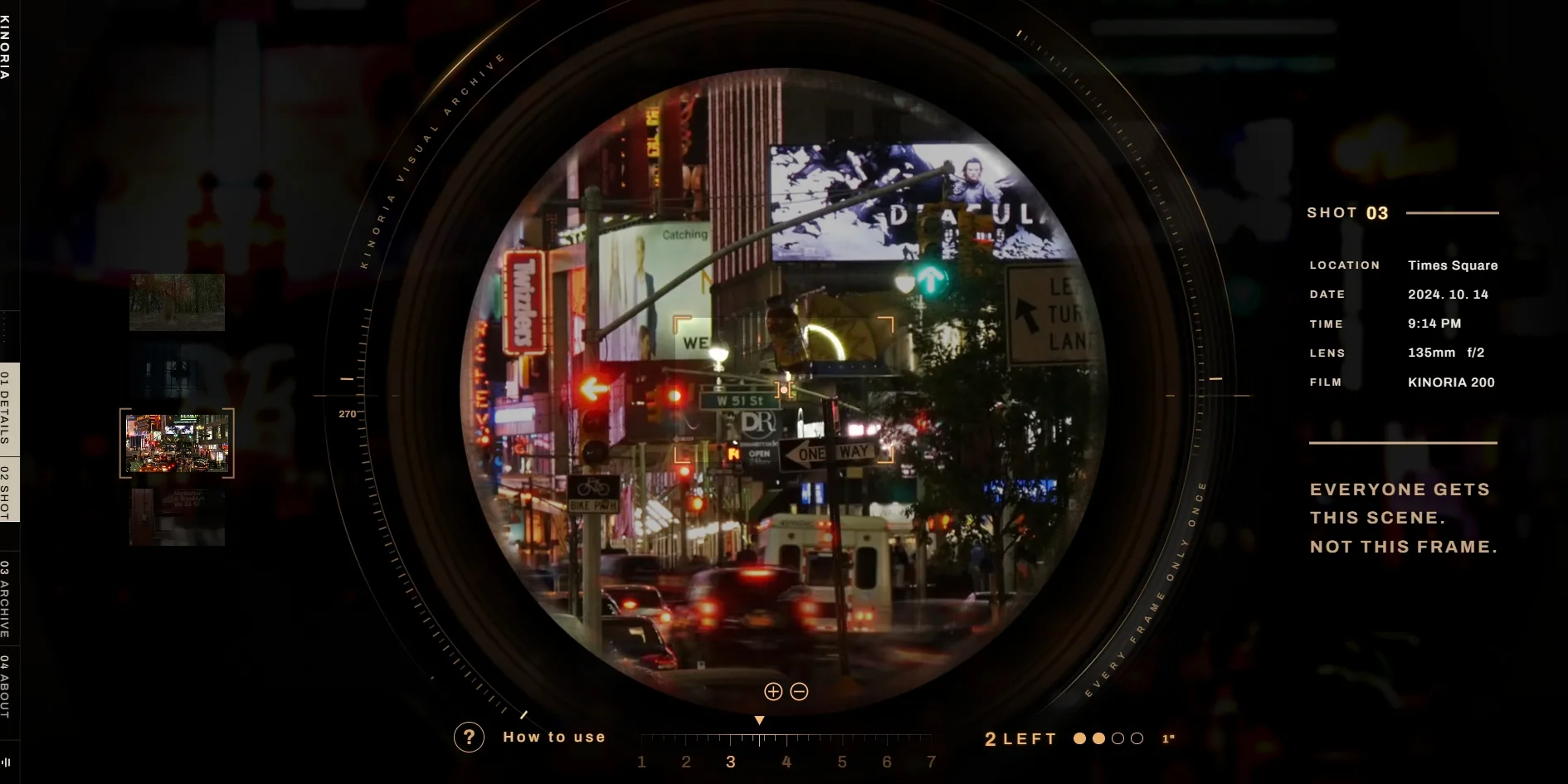 The finder aimed at Times Square at night, with neon signs and traffic filling the round view and the car lights at the bottom smeared, the SHOT 03 location, date, time, lens and film listed on the right, and 2 LEFT at the bottom