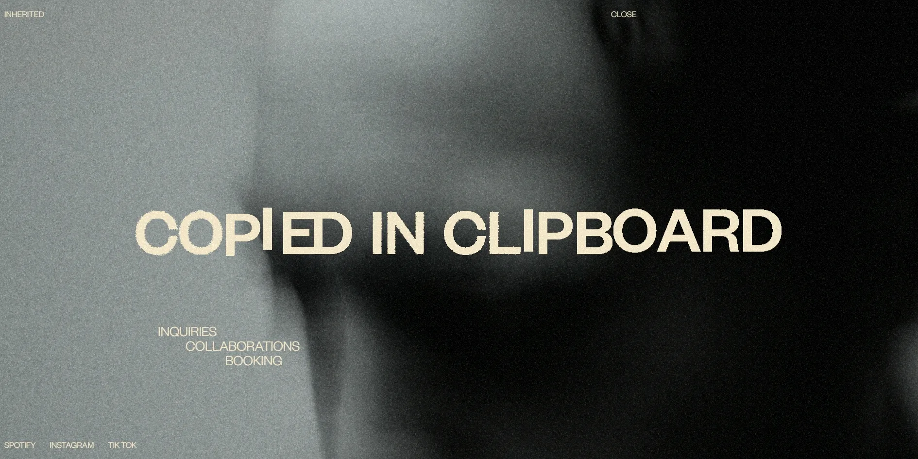 In the contact window a blurred black and white portrait fills the background. In the middle, the large trembling words COPIED IN CLIPBOARD appear, with one letter I pulled noticeably higher than the others