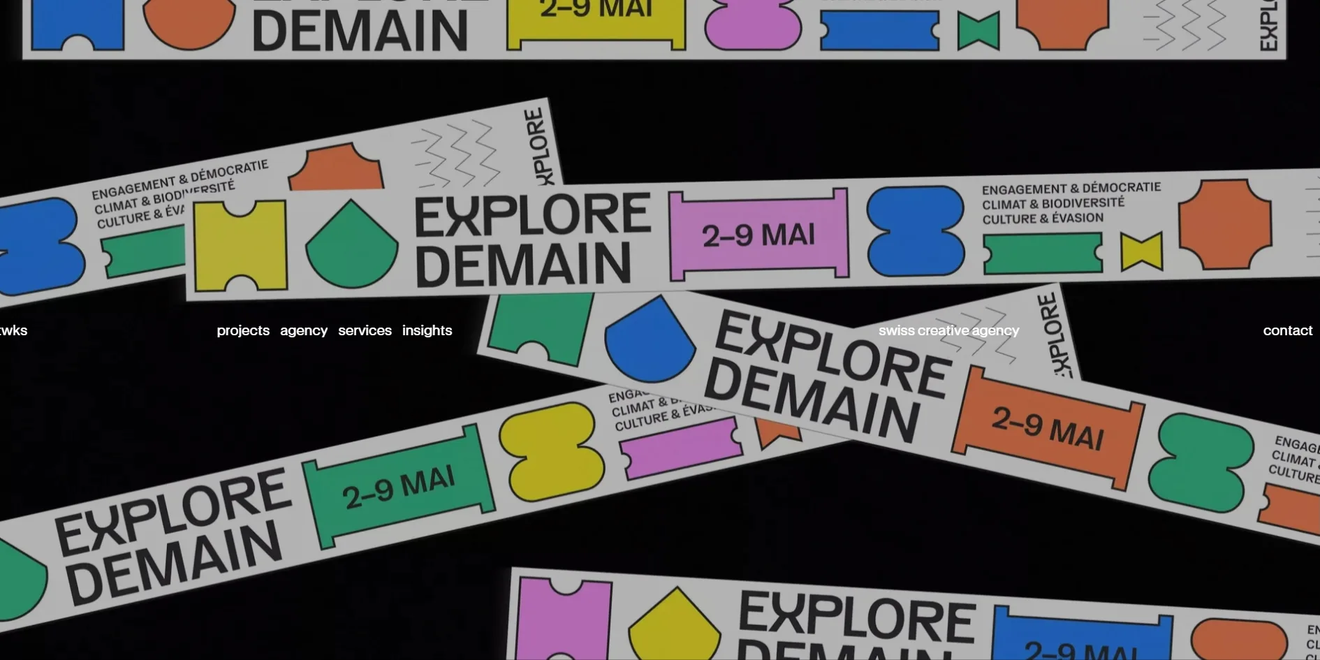 A festival banner photo fills the opening screen, with white tapes in bright colours crossing over black and printed with EXPLORE DEMAIN and 2–9 MAI, while a single white line of navigation runs across the middle of the picture, with projects, agency, services and insights on the left half and swiss creative agency and contact on the right half